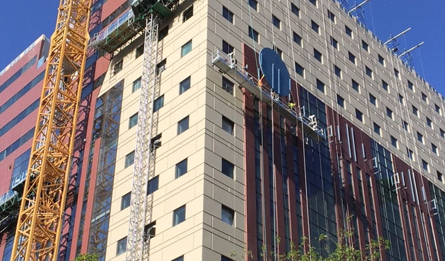 The Portland Building, in progress, construction, facade, Benson Industries